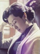 明鏡（劉敏濤飾演）