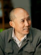 王友德（張喜前飾演）