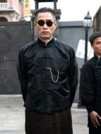 屠先生（劉佩琦飾演）