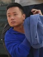 錢有為（吳健飾演）